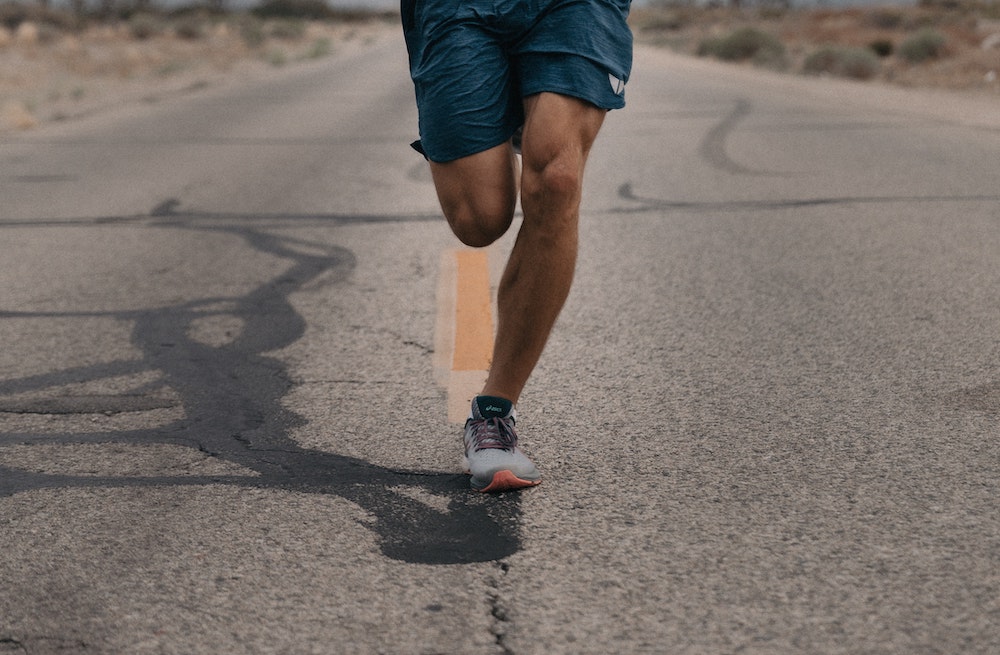 Man running on road