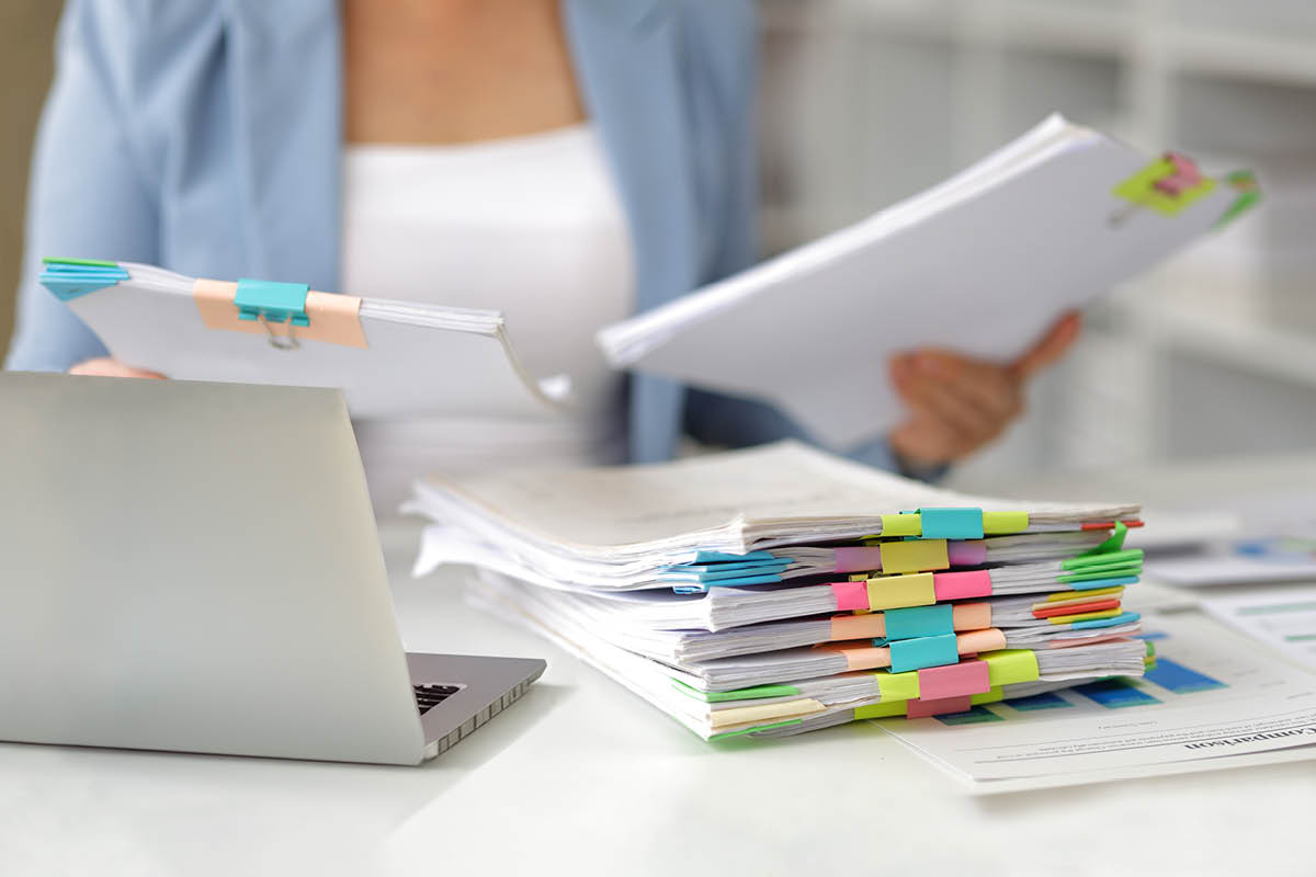 woman sorting paper