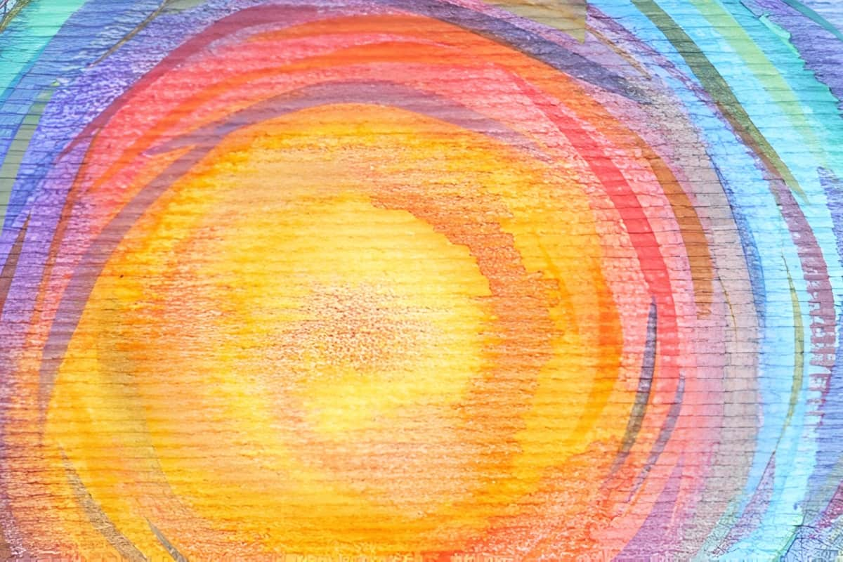 watercolor circular pattern radiating outwards from yellow to purple