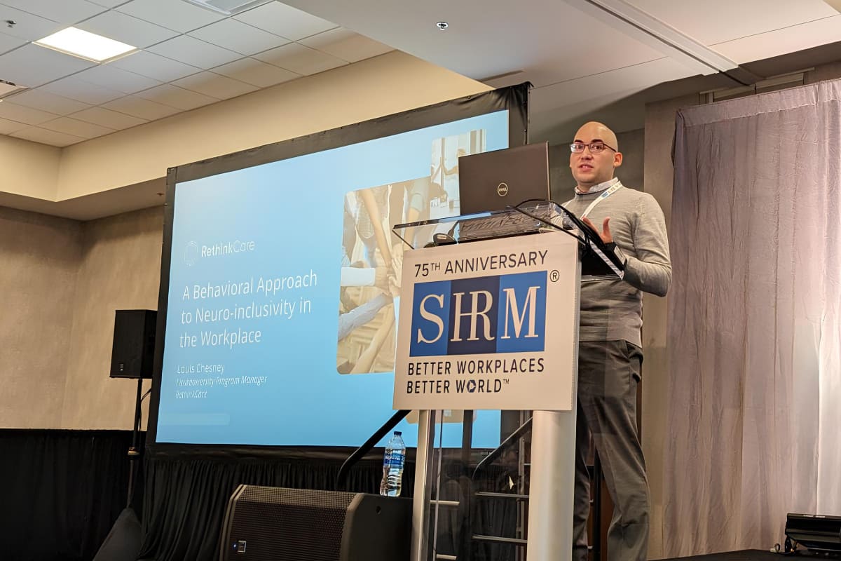 Louis Chesney giving presentation at SHRM Inclusion 2024 conference